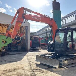 Hitachi ZX75US-5B compact excavator with NPK PH-4 breaker package, reliable one-owner construction equipment.